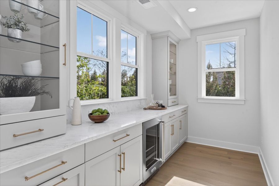 Representative furnished interior of a home built from the Newport II by Classica Homes in McLean - Hunts Point, Belmont (Image 14).