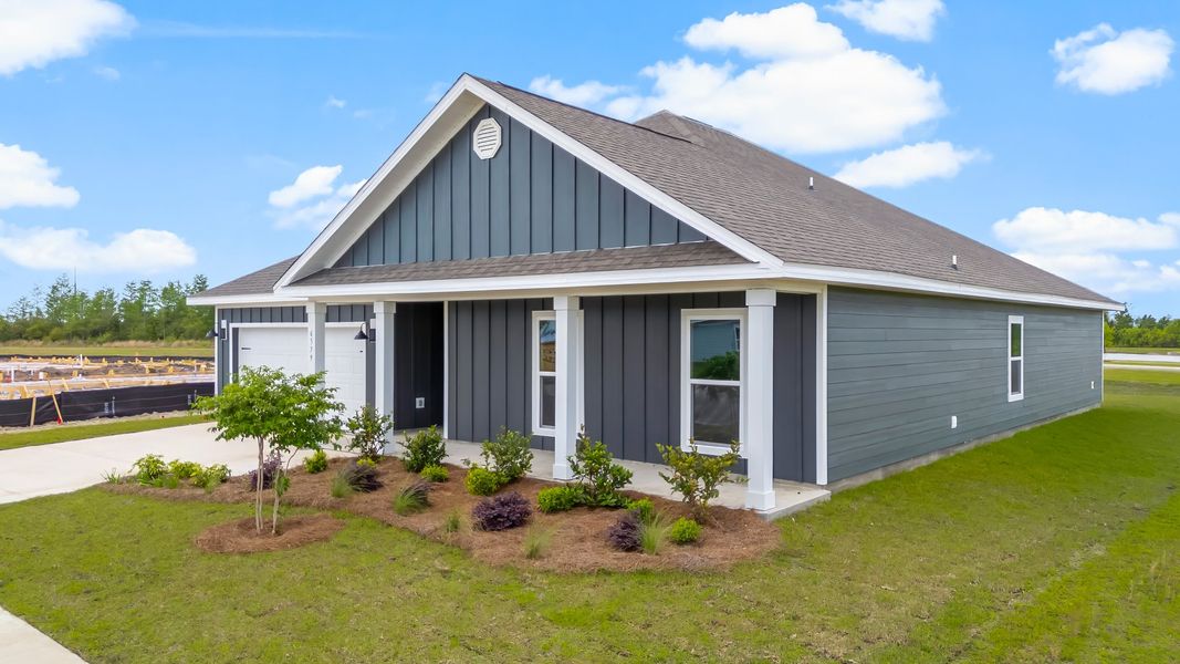 Representative exterior photo of a completed home built from the The Victoria by D.R. Horton in Liberty, Panama City, FL (Image 30).