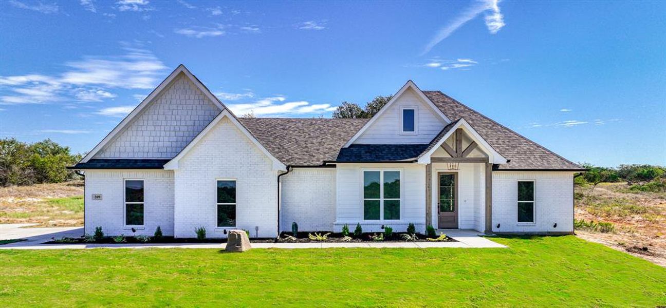 Front exterior of a new home in , Weatherford, TX, highlighting curb appeal (Image 20). Front exterior of a new home in , Weatherford, TX, highlighting curb appeal (Image 20).