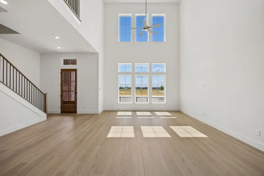 Spacious, unfurnished interior of a new home in Newman Village Townhomes, Frisco (Image 14).