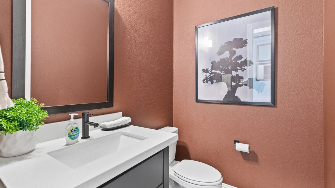 Representative furnished interior of a home built from the Mimosa by Brightland Homes in Sunterra, Katy (Image 11).