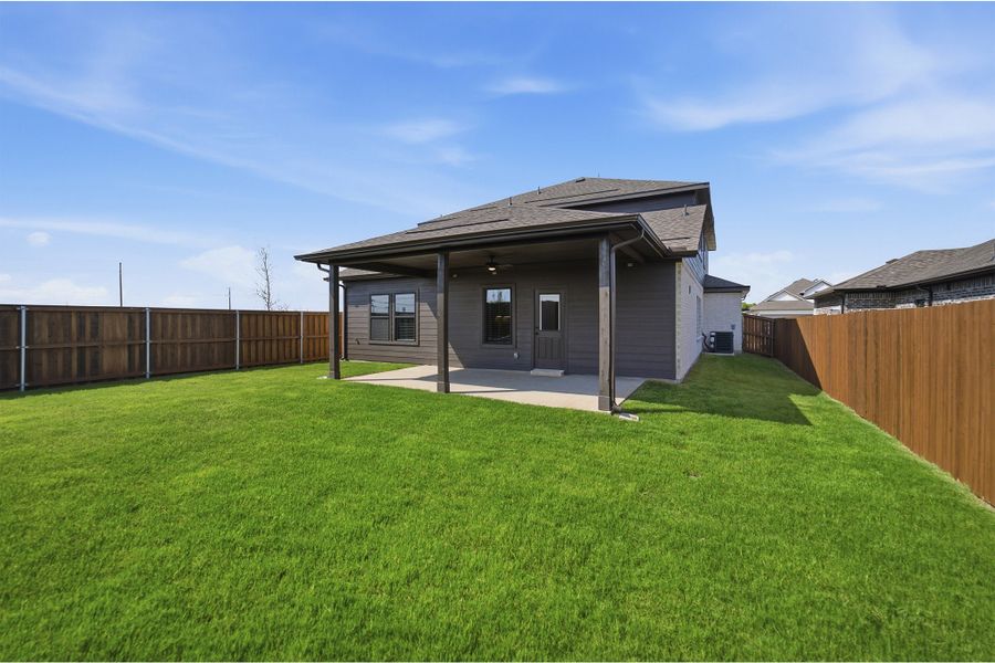 Exterior details and patio area of a home in Heartland, Crandall (Image 4).