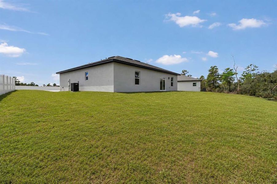 Exterior details and patio area of a home in , Ocala (Image 29).