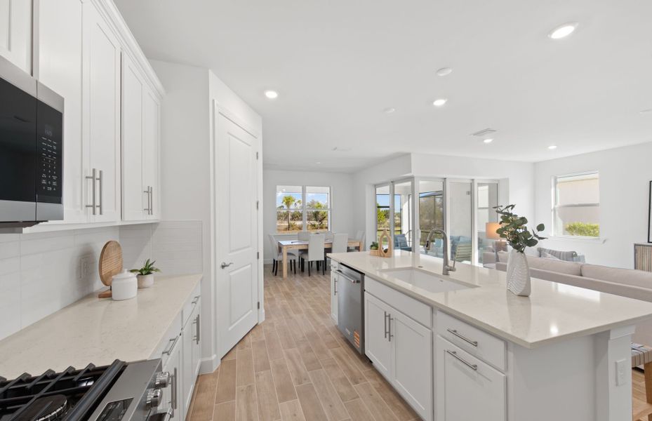 Furnished interior view inside a new home in TerraWalk at Babcock Ranch, Alva (Image 15).