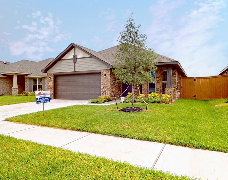 Front exterior of a new home in Cypress Green, Hockley, TX, highlighting curb appeal (Image 2). Front exterior of a new home in Cypress Green, Hockley, TX, highlighting curb appeal (Image 2).