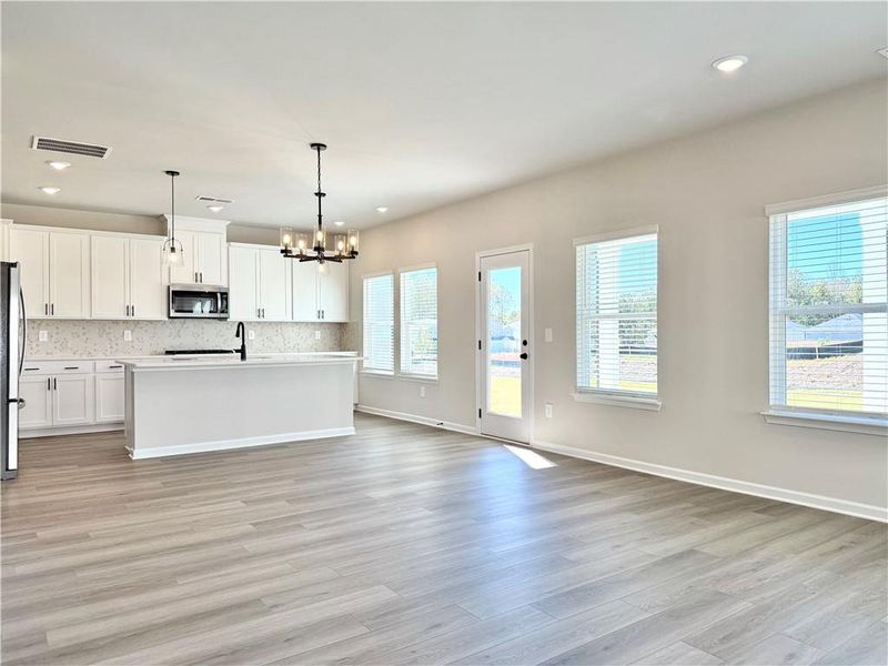 Spacious, unfurnished interior of a new home in Vines at Mill Creek - Estate Series, Braselton (Image 13). Spacious, unfurnished interior of a new home in Vines at Mill Creek - Estate Series, Braselton (Image 13).