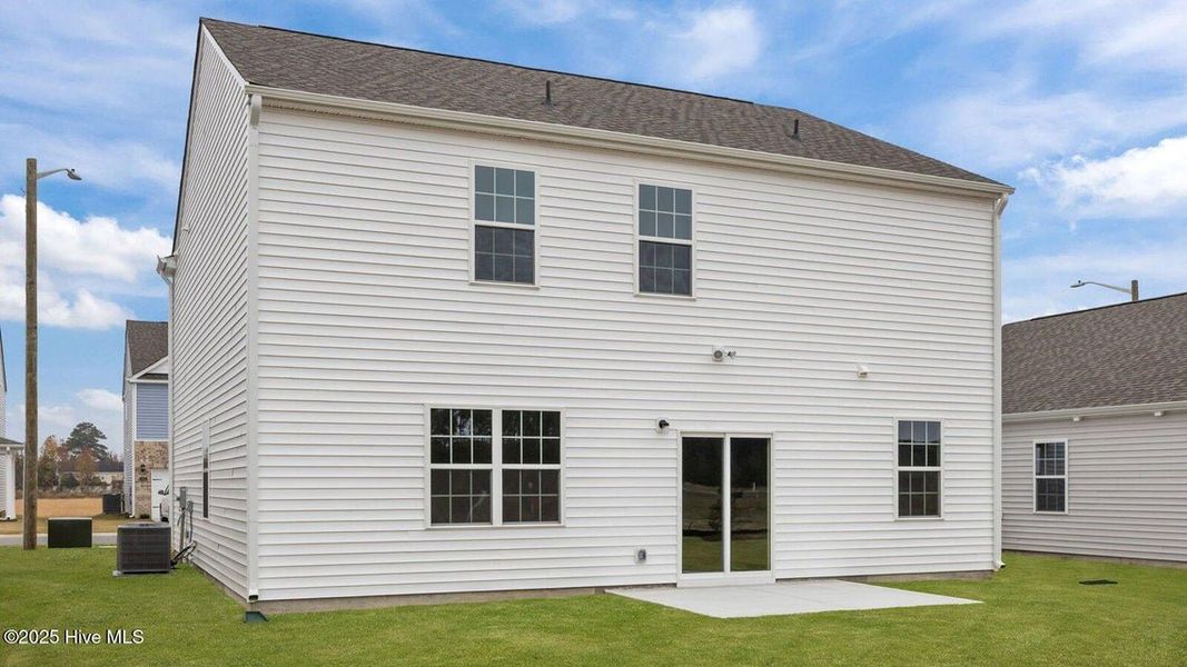 Exterior details and patio area of a home in Ridgewood Farms, Winterville (Image 4).