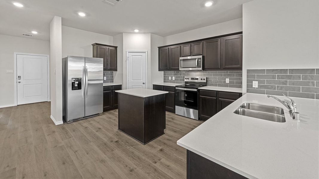 Furnished interior view inside a new home in Valor Farms, Royse City (Image 11).