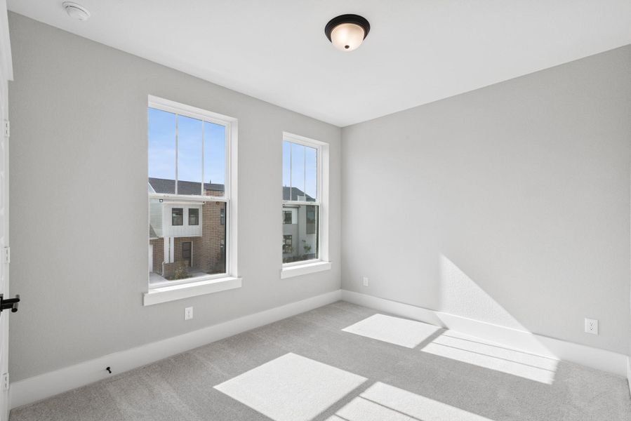 Spacious, unfurnished interior of a new home in Easthaven at Bridgeland Central - Horizon Collection, Cypress (Image 23).