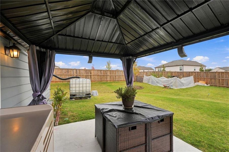 Exterior details and patio area of a home in Heritage Point, Hampton (Image 3).