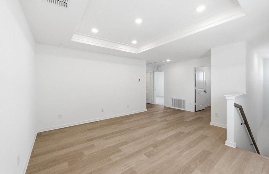 Spacious, unfurnished interior of a new home in Cameron Place, Manor (Image 15).