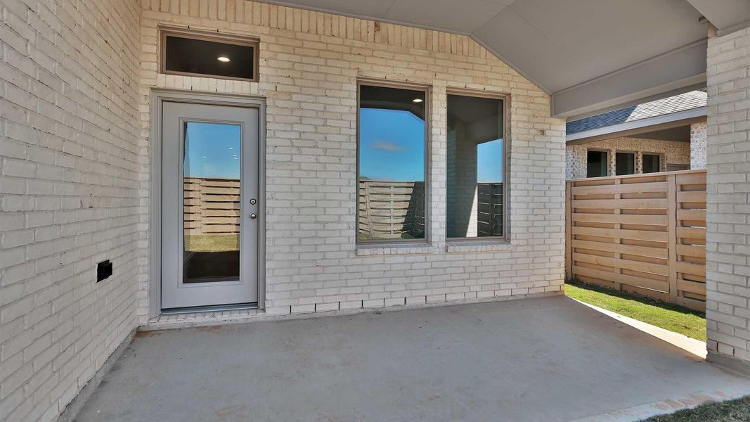 Exterior details and patio area of a home in Austin Point, Richmond (Image 3).