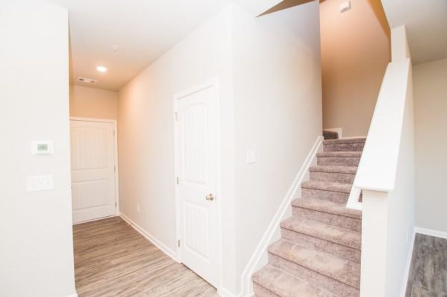 Representative unfurnished interior of a home built from the Cadence Unit A by Piedmont Residential in Ross Pointe, Kennesaw (Image 12).