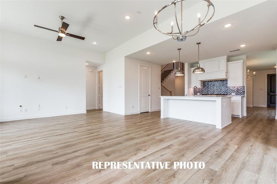 With the perfect open concept design, entertaining is a breeze in our Pascal floor plan.  REPRESENTATIVE PHOTO