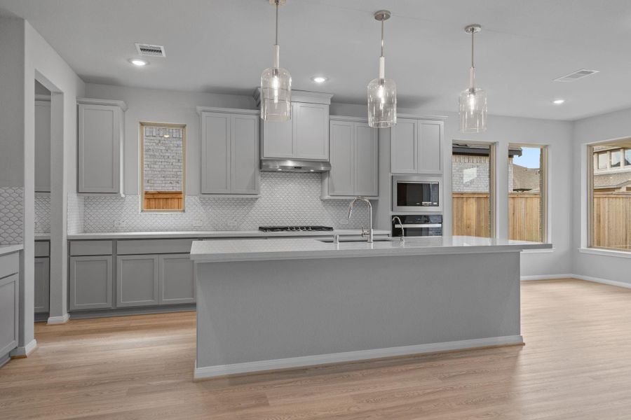 Furnished interior view inside a new home in Bridgeland 55', Cypress (Image 7).