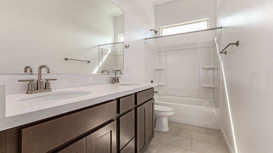 Furnished interior view inside a new home in Sycamore Farms, Surprise (Image 16).