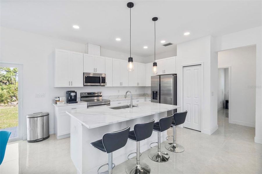 Furnished interior view inside a new home in , Port Charlotte (Image 11).