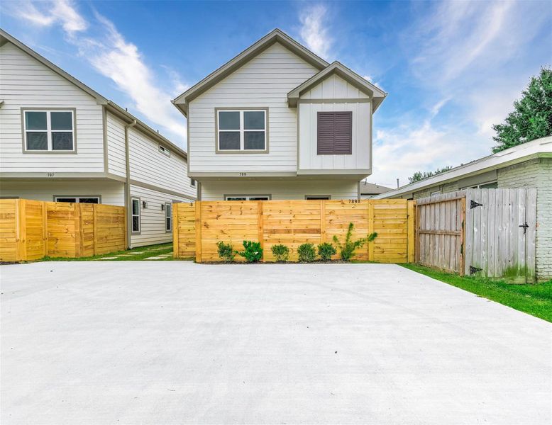 Modern two-story duplex with a stylish gabled roof and functional layout. Both units include private fenced yards, ideal for relaxing, entertaining, or pets.Located in a growing area with easy access to the Heights, Oak Forest, and Downtown Houston, offering a convenient lifestyle close to dining, shopping, and entertainment.