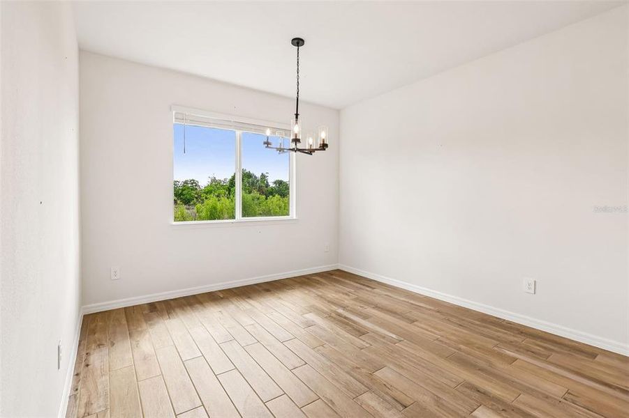 Spacious, unfurnished interior of a new home in The Grove at Stuart Crossing - Signature Series, Bartow (Image 20).
