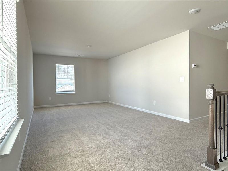 Spacious, unfurnished interior of a new home in Vines at Mill Creek - Estate Series, Braselton (Image 18).
