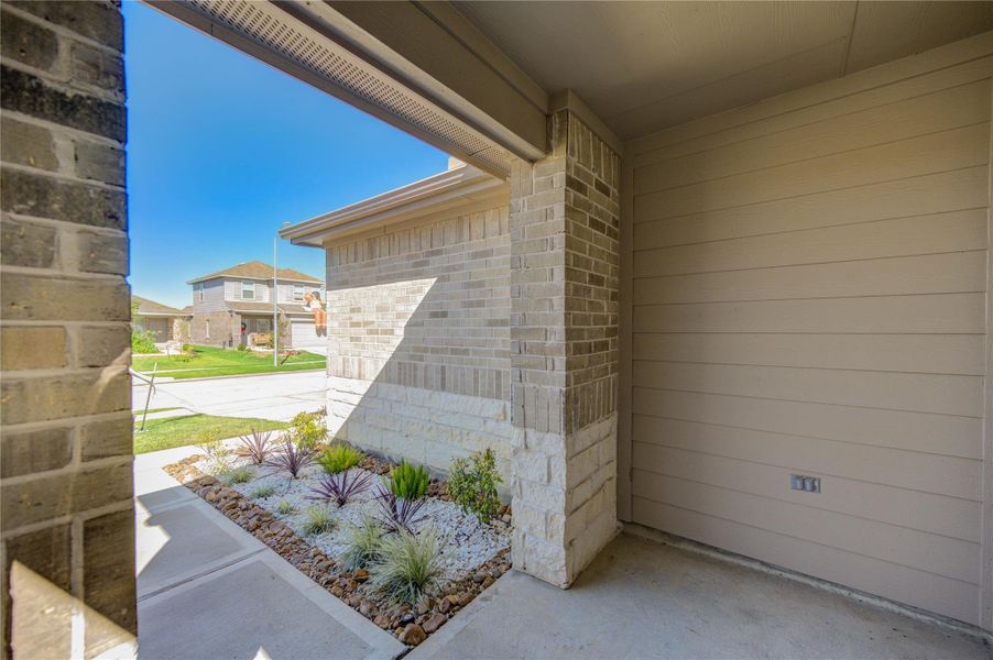 Exterior details and patio area of a home in Breckenridge Forest, Spring (Image 21).