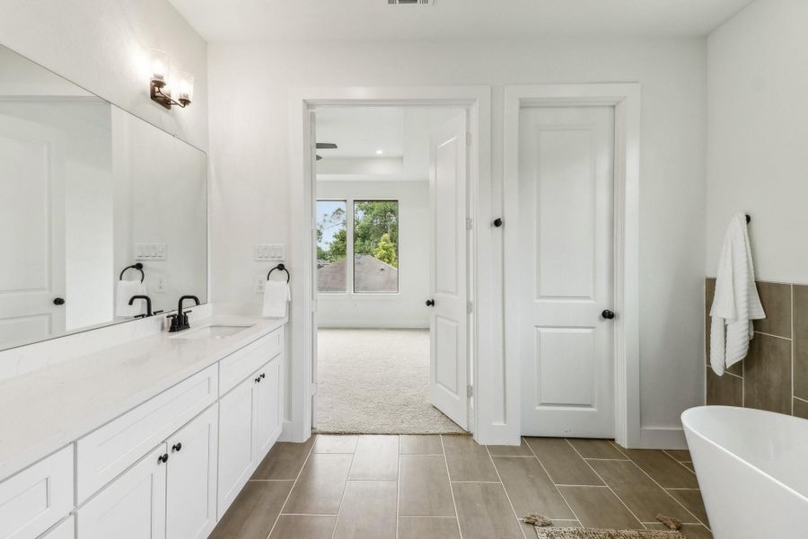 Primary bath. photo from a previous build.