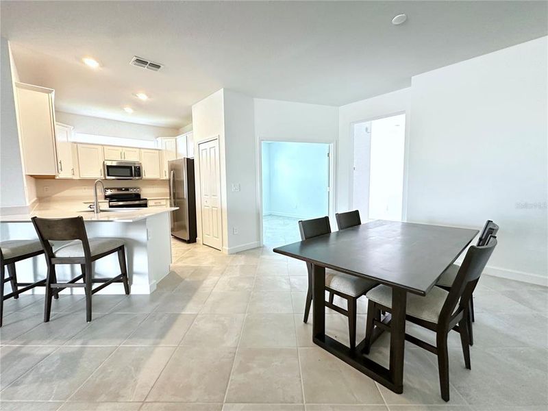 Furnished interior view inside a new home in Palm Lake at Coco Bay, Englewood (Image 13).
