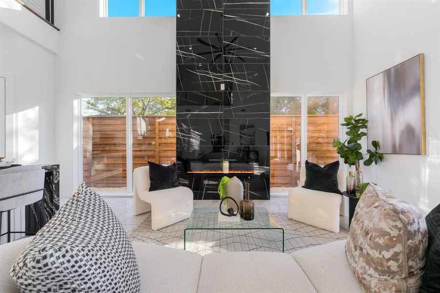 View of fireplace ready for comfy nights on the couch. View of fireplace ready for comfy nights on the couch.