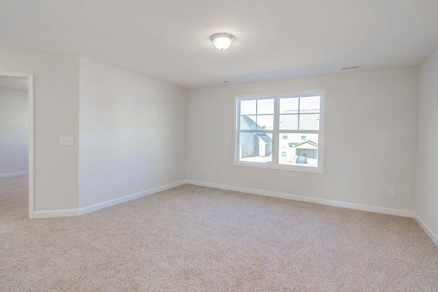 Representative unfurnished interior of a home built from the Drayton by Caviness & Cates Communities in Bartlett Manor, Youngsville (Image 197).
