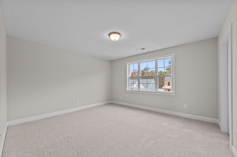 Spacious, unfurnished interior of a new home in Eli's Ridge, Winterville (Image 41).