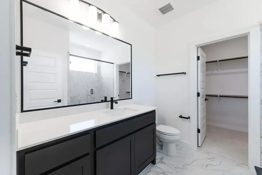 Furnished interior view inside a new home in Rough Hollow The District, Lakeway (Image 4). Furnished interior view inside a new home in Rough Hollow The District, Lakeway (Image 4).