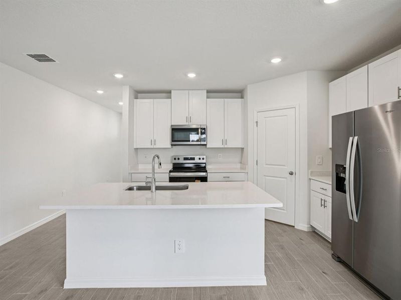 Furnished interior view inside a new home in Magnolia Bay - Classic Series, Nokomis (Image 7).