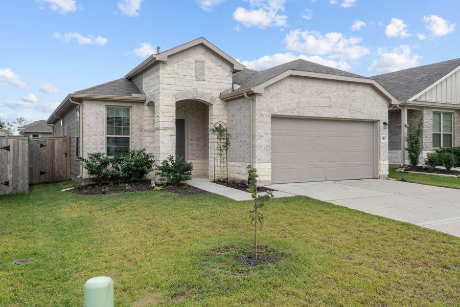 Exterior details and patio area of a home in The Pines At Seven Coves, Willis (Image 21). Exterior details and patio area of a home in The Pines At Seven Coves, Willis (Image 21).