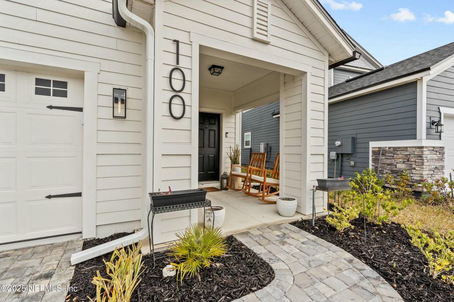 Front exterior of a new home in Silver Landing at SilverLeaf, St. Augustine, FL, highlighting curb appeal (Image 24).