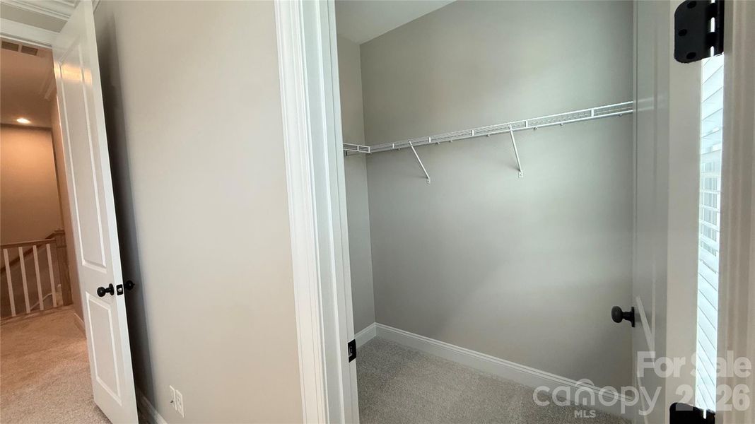 Spacious, unfurnished interior of a new home in The Townes at Wade Ardrey, Charlotte (Image 39).