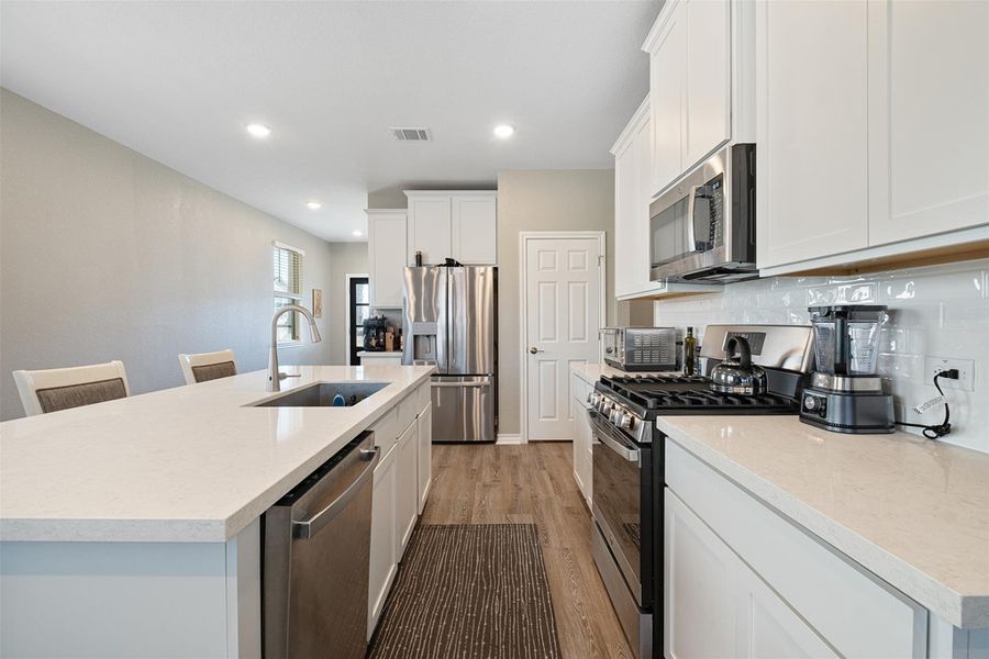Furnished interior view inside a new home in Sunfield, Buda (Image 11).