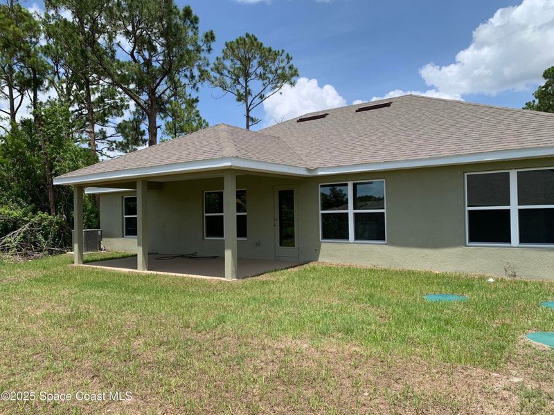 Exterior details and patio area of a home in Palm Bay, Palm Bay (Image 19). Exterior details and patio area of a home in Palm Bay, Palm Bay (Image 19).