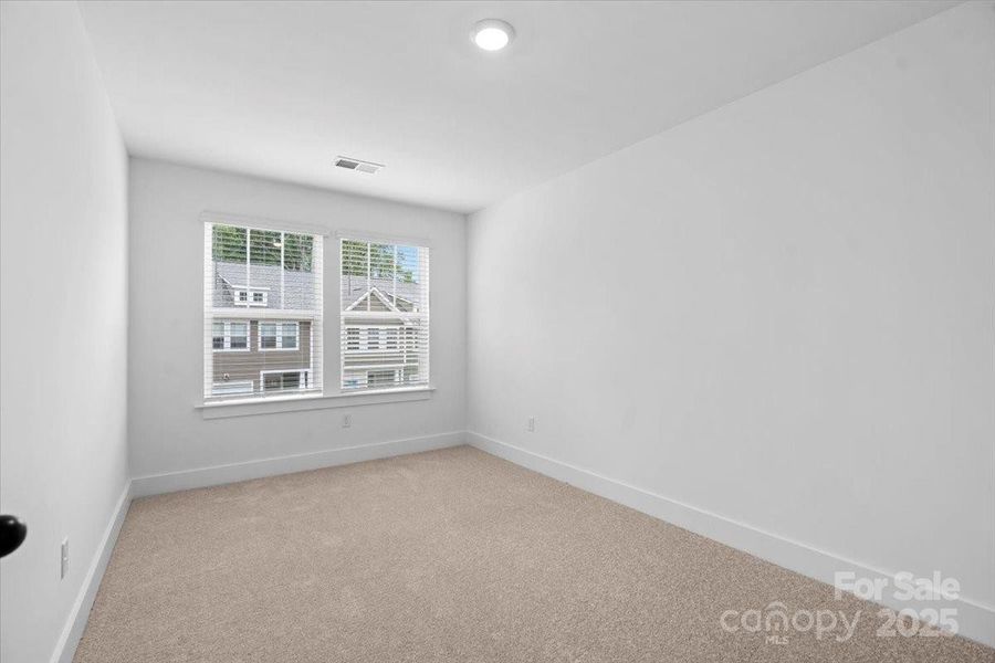 Spacious, unfurnished interior of a new home in Clayton Crossing, Arden (Image 24).