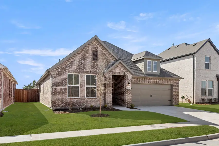 Representative exterior photo of a completed home built from the Liberty by Rockwell Homes in Wildflower Ranch, Fort Worth, TX (Image 2). Representative exterior photo of a completed home built from the Liberty by Rockwell Homes in Wildflower Ranch, Fort Worth, TX (Image 2).