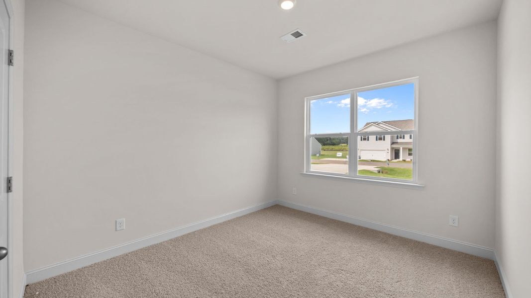 Spacious, unfurnished interior of a new home in Beaver Dam Crossing, Bailey (Image 19).
