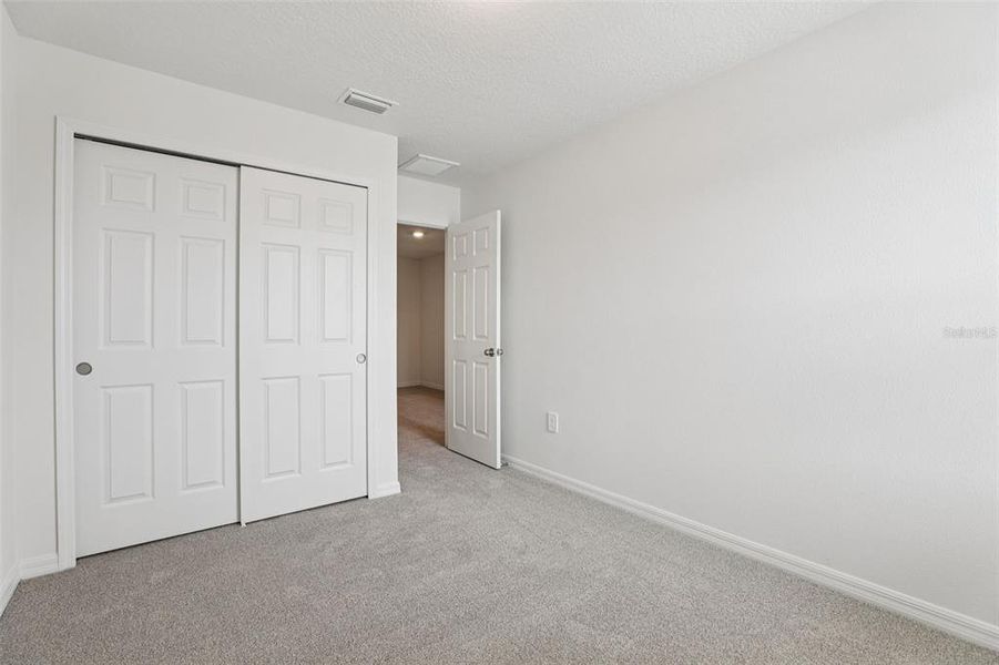 Spacious, unfurnished interior of a new home in Cagan Crossings West, Clermont (Image 30).