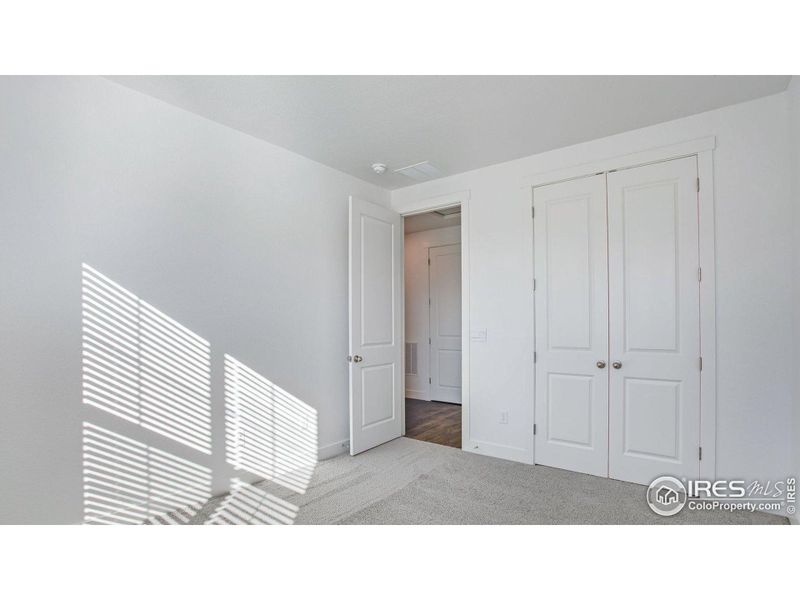 Spacious, unfurnished interior of a new home in Vantage, Berthoud (Image 16).