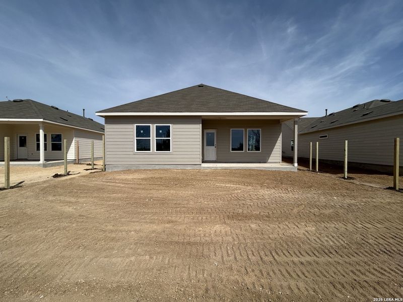 Exterior details and patio area of a home in Hennersby Hollow, San Antonio (Image 4).