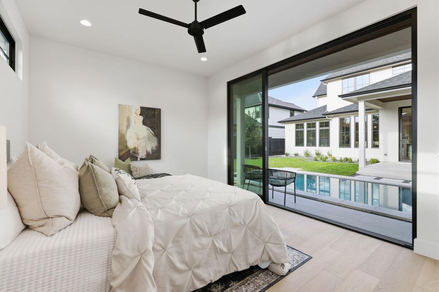 View from Pool House looking at pool and rear of Main House