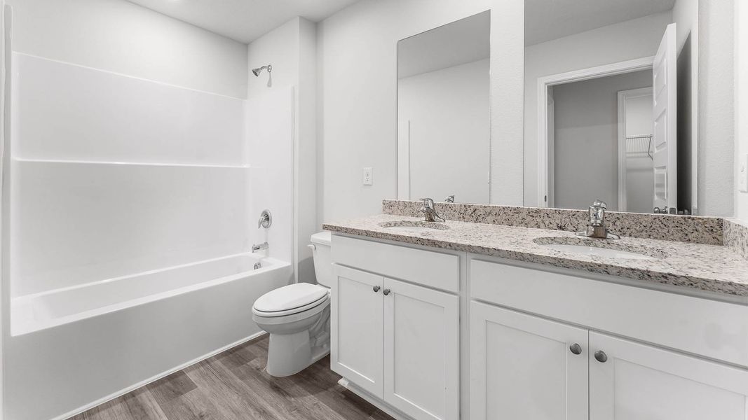 Representative furnished interior of a home built from the The Aisle by D.R. Horton in Chateau Nemours, Port Saint Joe (Image 16).