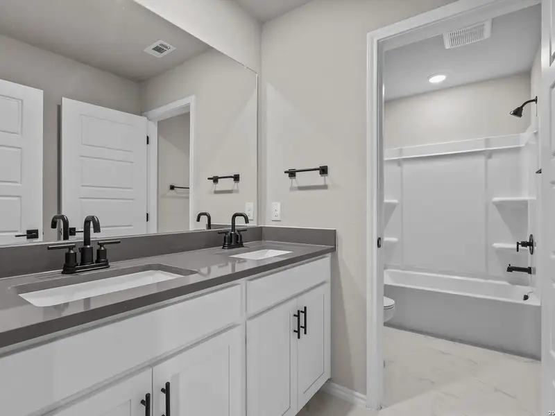 Furnished interior view inside a new home in Bricewood, San Antonio (Image 20).