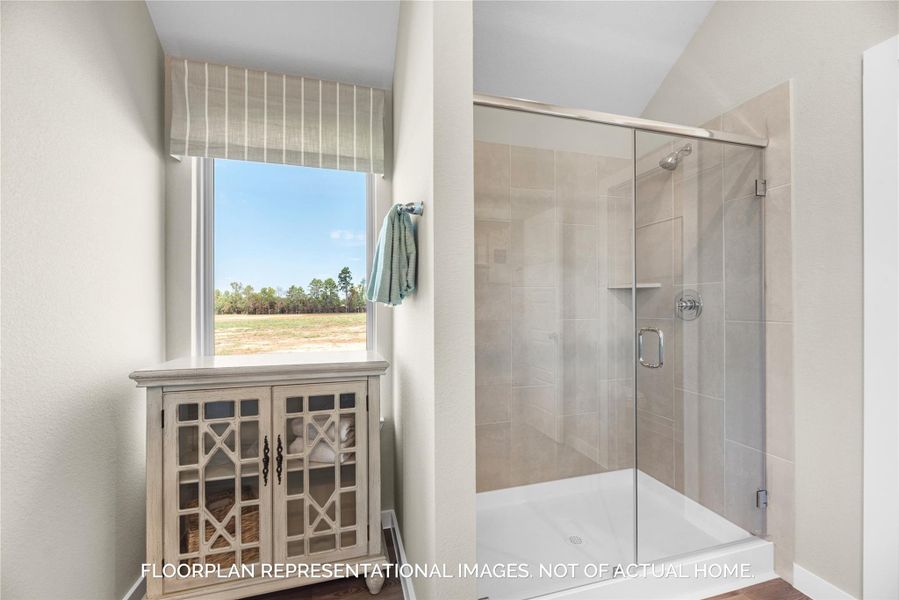 Furnished interior view inside a new home in Pinewood at Grand Texas, New Caney (Image 9).