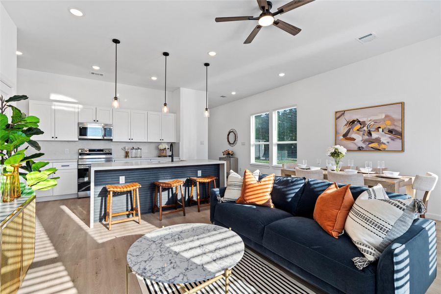 Bright and welcoming living room with plenty of natural light, designed as the heart of the home. Bright and welcoming living room with plenty of natural light, designed as the heart of the home.