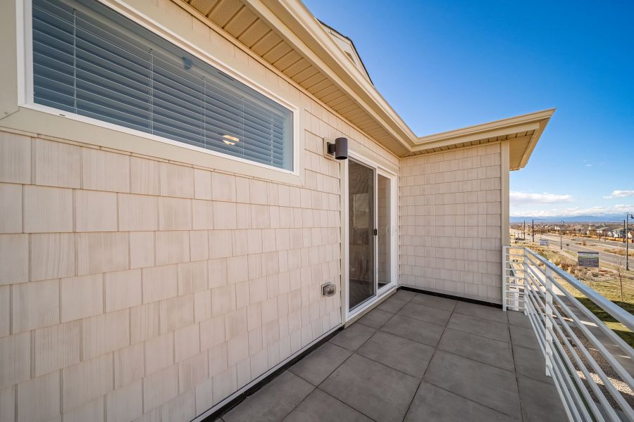 Exterior details and patio area of a home in Reunion, Commerce City (Image 4).