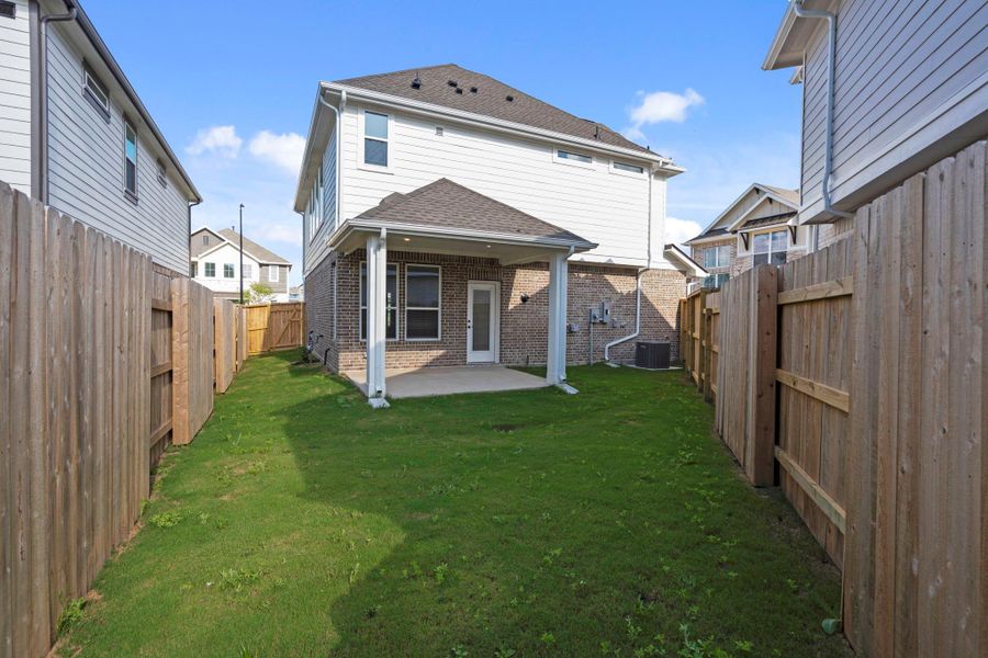 Exterior details and patio area of a home in Elyson, Katy (Image 22).